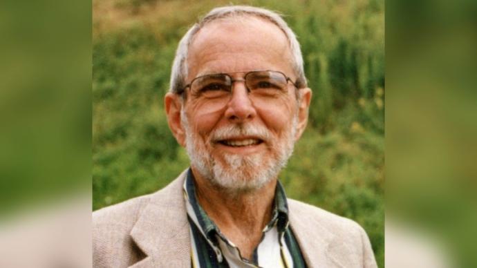 a portrait of Kenneth Hummel smiling